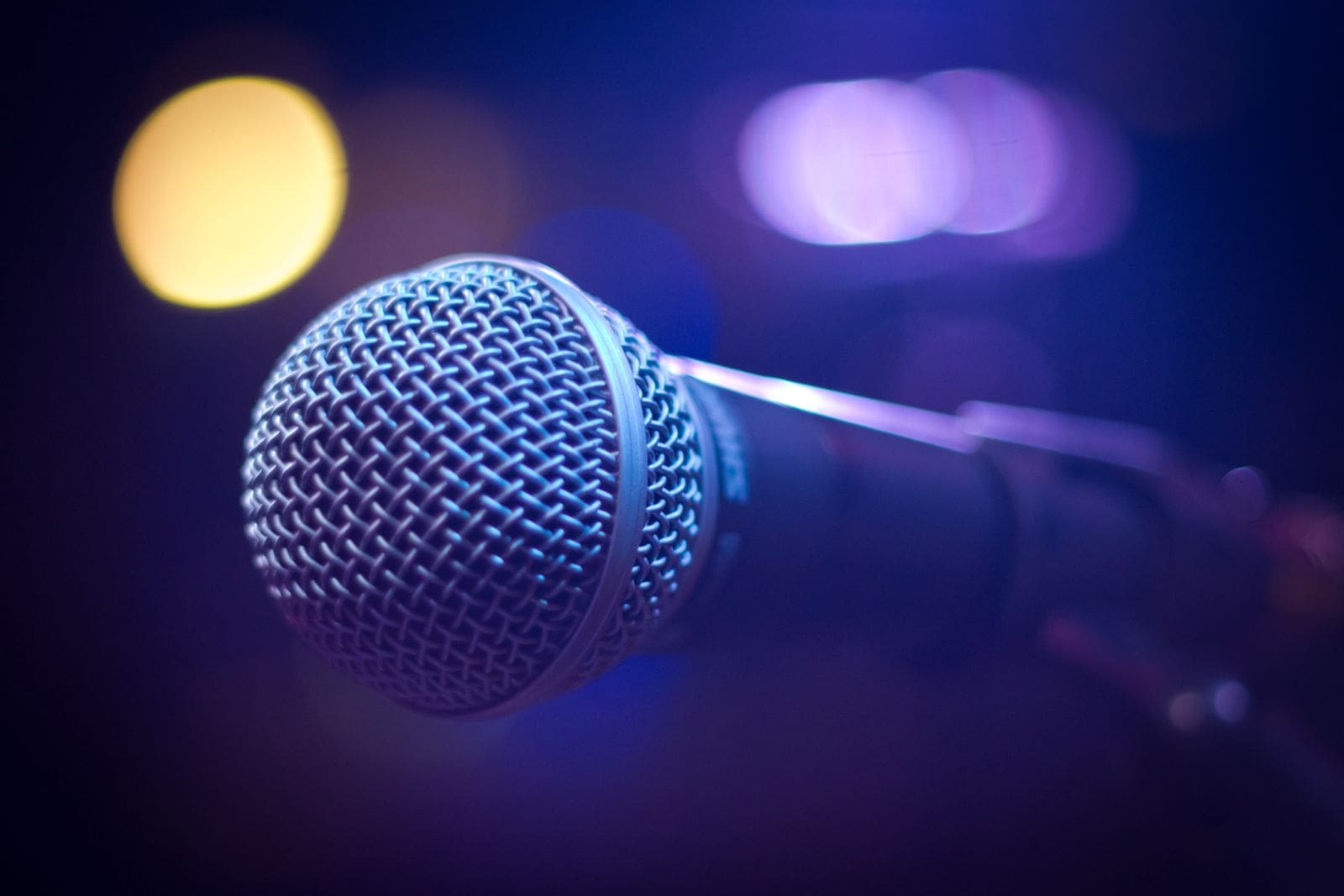 Vintage microphone at a wooden pulpit, evoking mid-century preaching