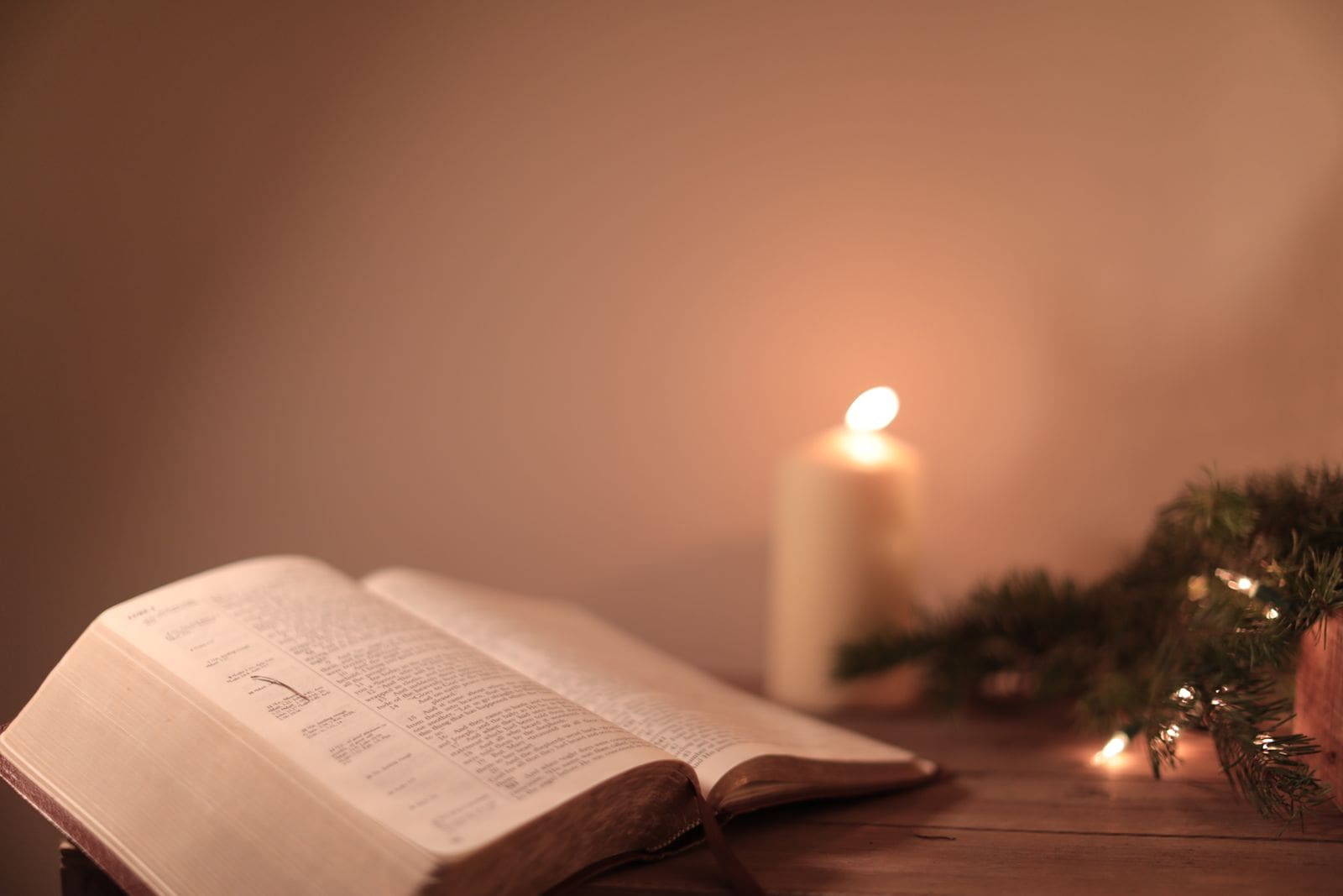 Open Bible by candlelight, the kind of evening Matthew Henry sat down to write his diary of thanks