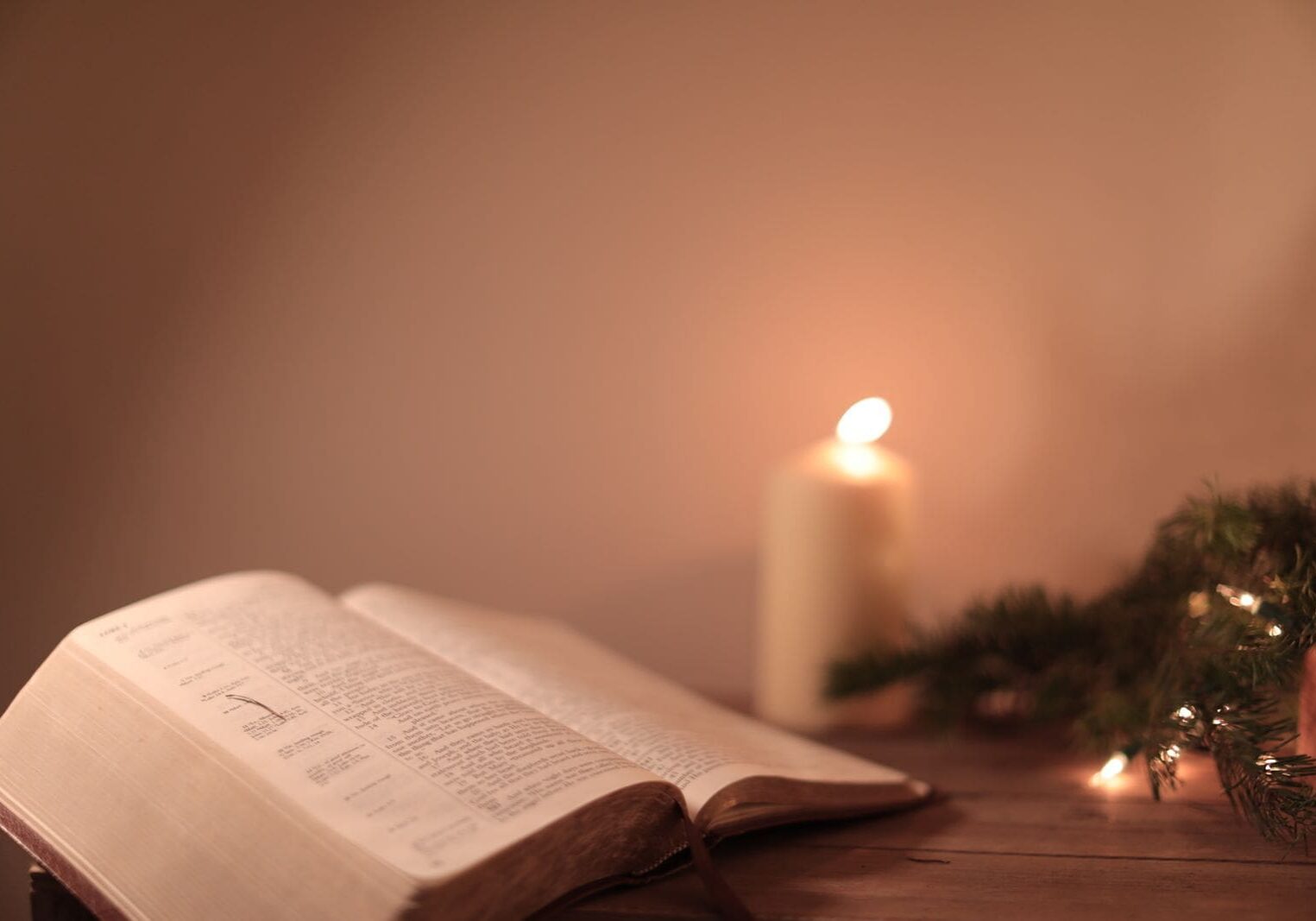 Open Bible by candlelight, the kind of evening Matthew Henry sat down to write his diary of thanks